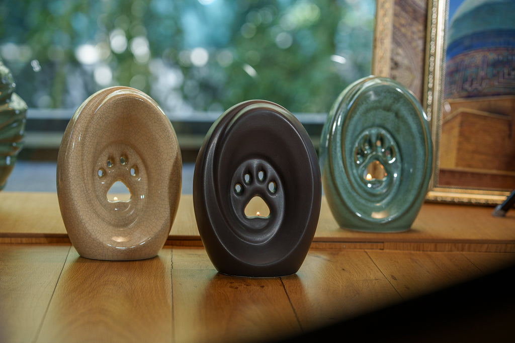 Grande patte avec bougie chauffe-plat - Urne pour cendres 